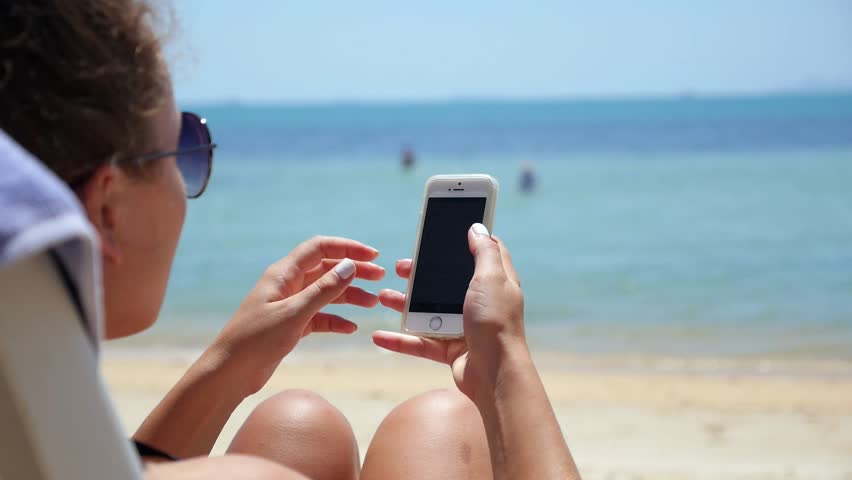 mobile phones on beach